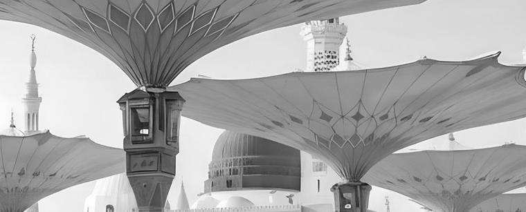 The green dome and a minaret of the Prophet's Mosque in Madinah